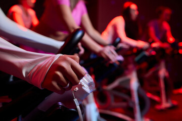 Musical instrument enthusiasts enjoy playing guitars in a gym