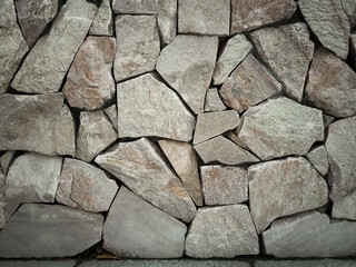 Intricate Texture of Natural Stones in a Rustic Wall Design