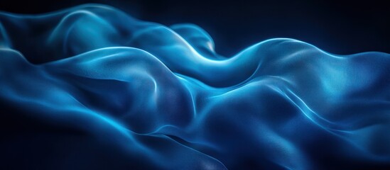 Obraz premium Abstract blue wave pattern background with flowing lines.