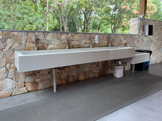 Modern Outdoor Handwashing Station Surrounded by Nature