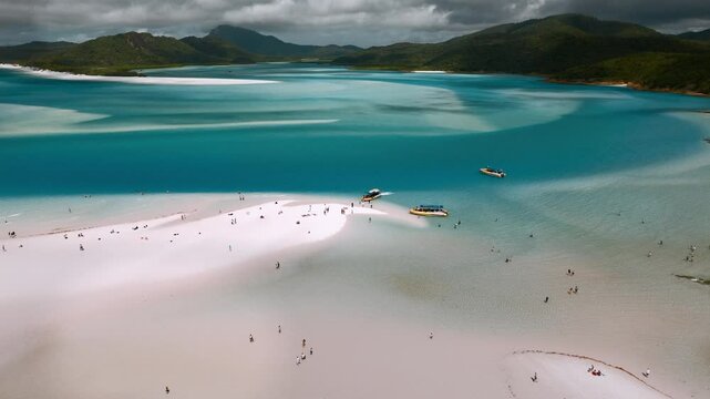 Aerial view of whitehaven beach with blue waters and sandy shores, whitsundays, australia.