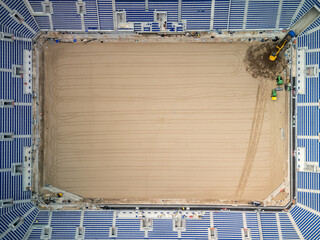 Construction workers building new everton fc stadium at bramley-moore dock, liverpool, england