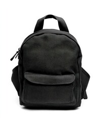 Naklejka premium Black Backpack Isolated: Essential for Backpackers and Travelers on White Background