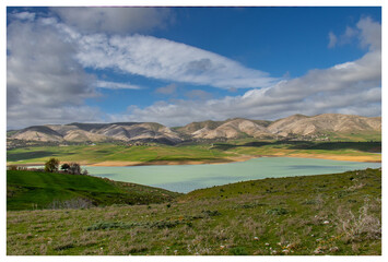 Scenic Beauty of Kasseb Dam: A Majestic View of Mountains and Lake in Bousalem, Beja, Tunisia,...