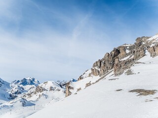 Snow-covered rocky mountain landscape in the French Alps