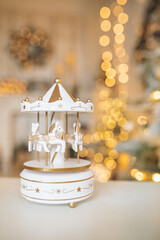 Beautifully illuminated Christmas decoration with sparkling lights, Christmas trees, stars, teddy bears and presents.	
