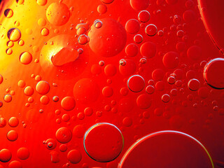 Abstract Background Red oil Macro Colorful artistic of oil drop floating on the water. macro red...