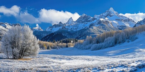 A serene mountain landscape after a fresh snowfall, with untouched snow and tall, majestic peaks in the distance.