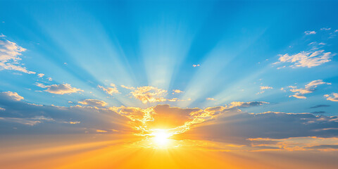 Fototapeta premium Golden sun radiating sunrays against a blue sky, creating a divine and heavenly scene. Ideal for content focused on inspiration, nature, or uplifting themes.
