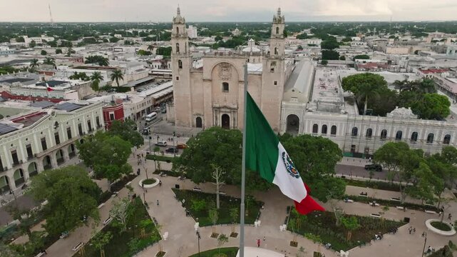Aerial view of the beautiful Merida Plaza featuring historic architecture, a cathedral, and greenery, Merida, Mexico.