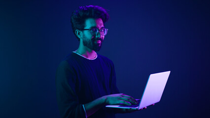 Arabian Indian man guy male programmer coder employer freelancer working using internet computer...