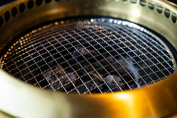 Korean charcoal grill and charcoal in the restaurant