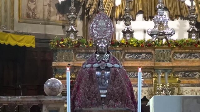 Reliquary bust of San Gennaro from 1305 is dressed with a silk and gold cope and mitre from the 18th century. Naples Cathedral, Italy. 