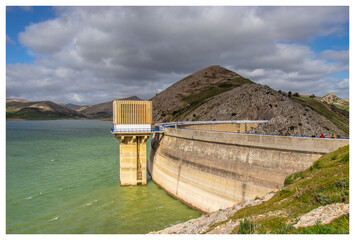 Scenic Beauty of Kasseb Dam: A Majestic View of Mountains and Lake in Bousalem, Beja, Tunisia,...