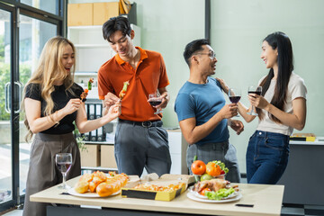 celebration successful deal with champagne and pizza in the workplace.