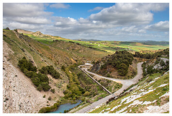 Scenic Beauty of Kasseb Dam: A Majestic View of Mountains and Lake in Bousalem, Beja, Tunisia,...