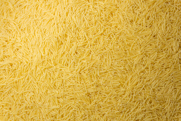 Uncooked Filini Pasta: A Culinary Canvas of Noodles, Creating a Lively and Textured Background for Gourmet Cooking. Dry Pasta. Raw Macaroni - Top View, Flat Lay