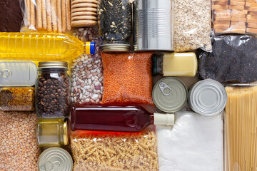 Home food supplies for quarantine and isolation, including canned food, cereals, pasta, and essential staples for survival, survival during military operations, the concept of stay at home