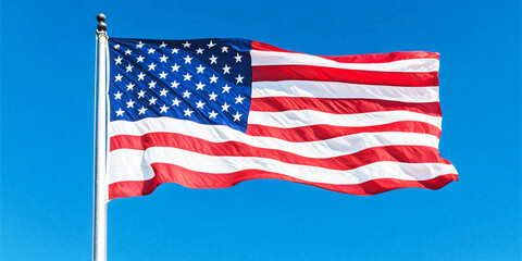 Fototapeta premium American Flag blowing in the wind with a blue sky, USA American Flag. Waving United states of America famous flag in front of blue sky. Independence Day, Labor day, Flag Day - American Celebration