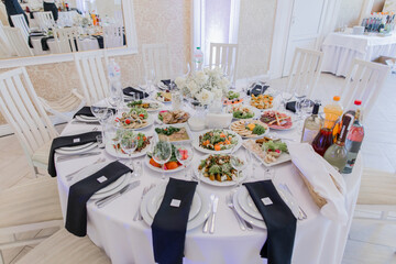 food and drinks on a festive table in a restaurant on a wedding birthday