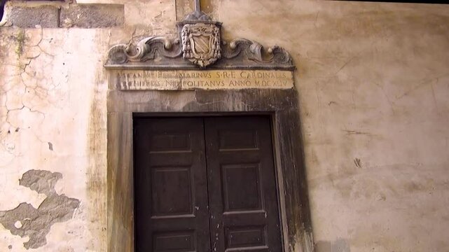 Neapolitan Archives of 1644 during Cardinal Period of Archbishop Ascanio Filomarino in the old courtyard of the archiepiscopal curia outside the Cathedral of Naples, Italy.