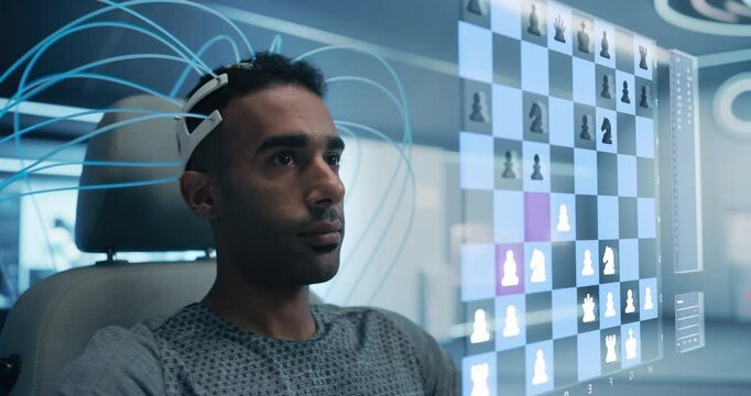 Man in a Futuristic Lab Wears a Neural Headset, Game of Virtual Chess Where Holographic Pieces. Interaction Using Brainwave-Controlled Digital Interfaces, Advanced AI Mind-Machine Integration