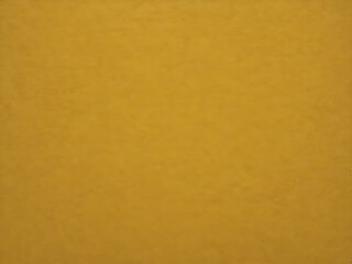 Obraz premium A rich mustard yellow background with minimal grain texture, creating a warm, nostalgic mood