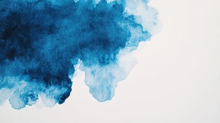 Abstract watercolor texture in deep blue hues on a white background.