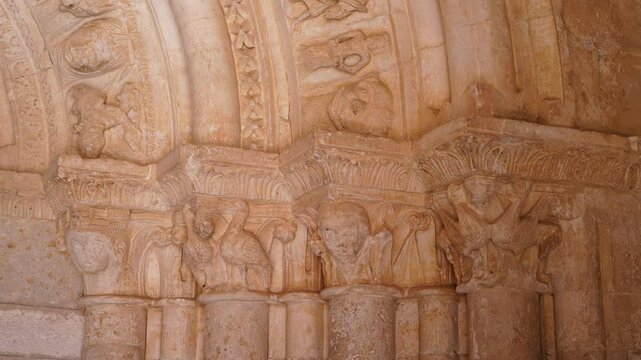 Romanesque arch portico of the Church of San Esteban Protom&aacute;rtir in the village of Hormaza. Region of Alfoz de Burgos. Province of Burgos. Castile and Leon. Spain. Europe