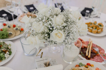 food and drinks on a festive table in a restaurant on a wedding birthday