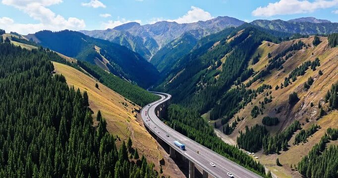 Highway passing through the valley. Transportation concept.