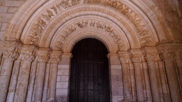 Romanesque arch portico of the Church of San Esteban Protom&aacute;rtir in the village of Hormaza. Region of Alfoz de Burgos. Province of Burgos. Castile and Leon. Spain. Europe