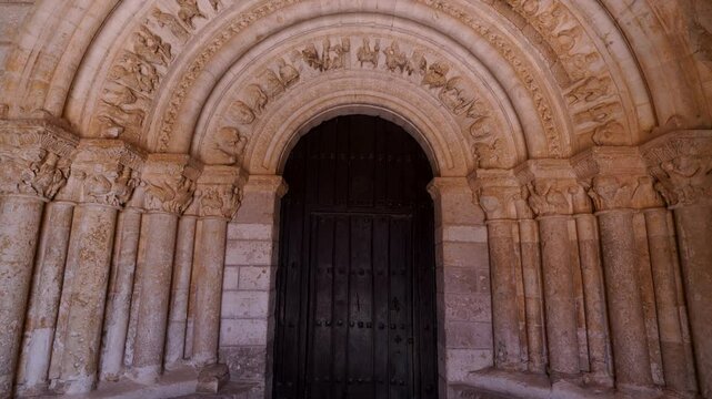 Romanesque arch portico of the Church of San Esteban Protom&aacute;rtir in the village of Hormaza. Region of Alfoz de Burgos. Province of Burgos. Castile and Leon. Spain. Europe