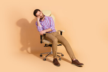 Photo portrait of brunet hair adult handsome businessman wearing formal outfit sit chair slumber...