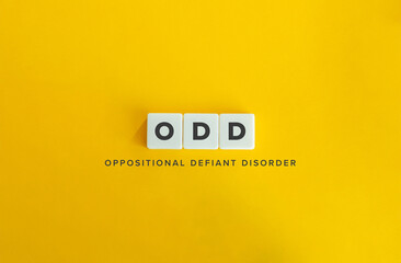 Oppositional Defiant Disorder (ODD). Block Letter Tiles on Flat Background. Minimalist Aesthetics.