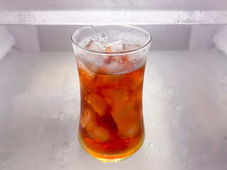 Asian food dishes peach iced tea in the refrigerator