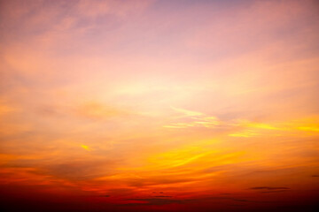 Fototapeta premium Beautiful , luxury soft gradient orange gold clouds and sunlight on the blue sky perfect for the background, take in everning,Twilight, Large size, high definition landscape photo