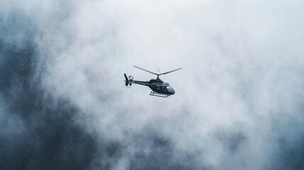 Helicopter flying close to a waterfall, mist rising in the air