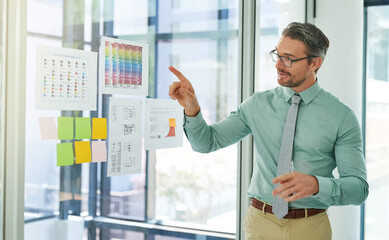 Talking businessman, presentation and color chart for change management, progress report and...