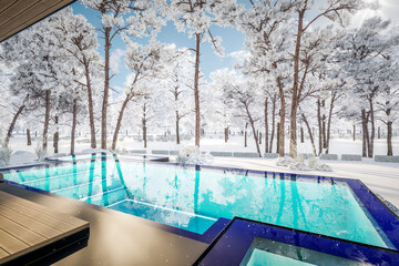 3d rendering of modern two story house with gray and wood accents, large windows, parking space in the right side of the building. Cool winter day with shiny white snow