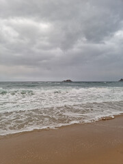 
It is Sampo Beach under a cloudy sky.