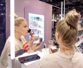  palette of powder and foundation , powder and makeup brush