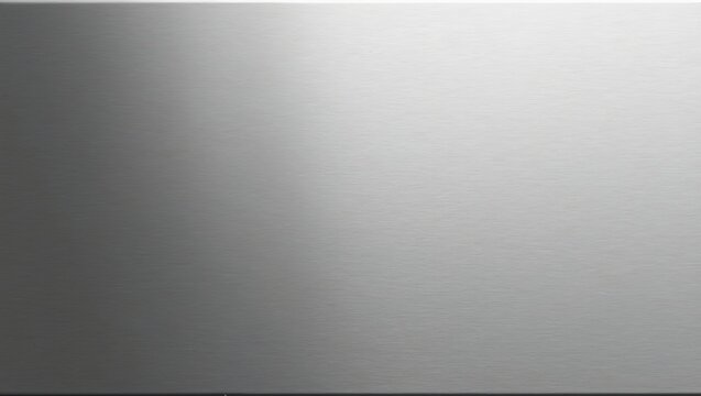 Brushed stainless steel close up with soft matte finish and subtle horizontal lines reflecting light
