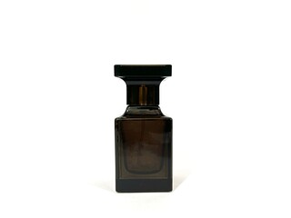 Luxury and elegant perfume bottle with unique shape made from dark brown color glass isolated on white background © FaizZakiy