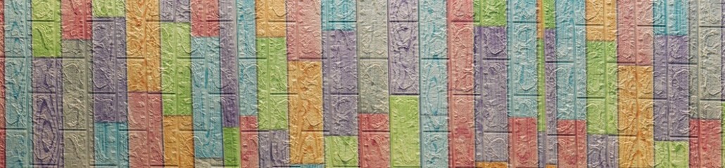 Colorful brick wall painted. multi-colored masonry. rainbow background