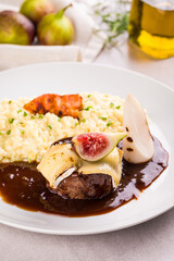 Gourmet Beef Dish with Fig and Creamy Risotto