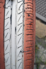 A colorful, old tyre on a pathway in Hanoi-Vietnam.