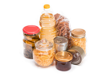 Food Reserves: Canned Food, Spaghetti, Pate, Tuna, Tomato Juice, Pasta, Fish and Grocery - Isolated on White Background. Emergency Food Storage in Case of Crisis. Strategic Food Supplies - Isolation