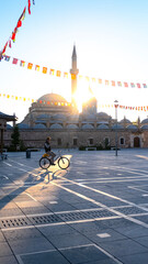 Life continues in Konya city center while the sun has just risen. View of the city's landmarks and...