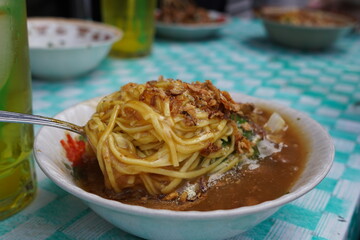 A bowl of Mie Ongklok, a popular Indonesian noodle dish.